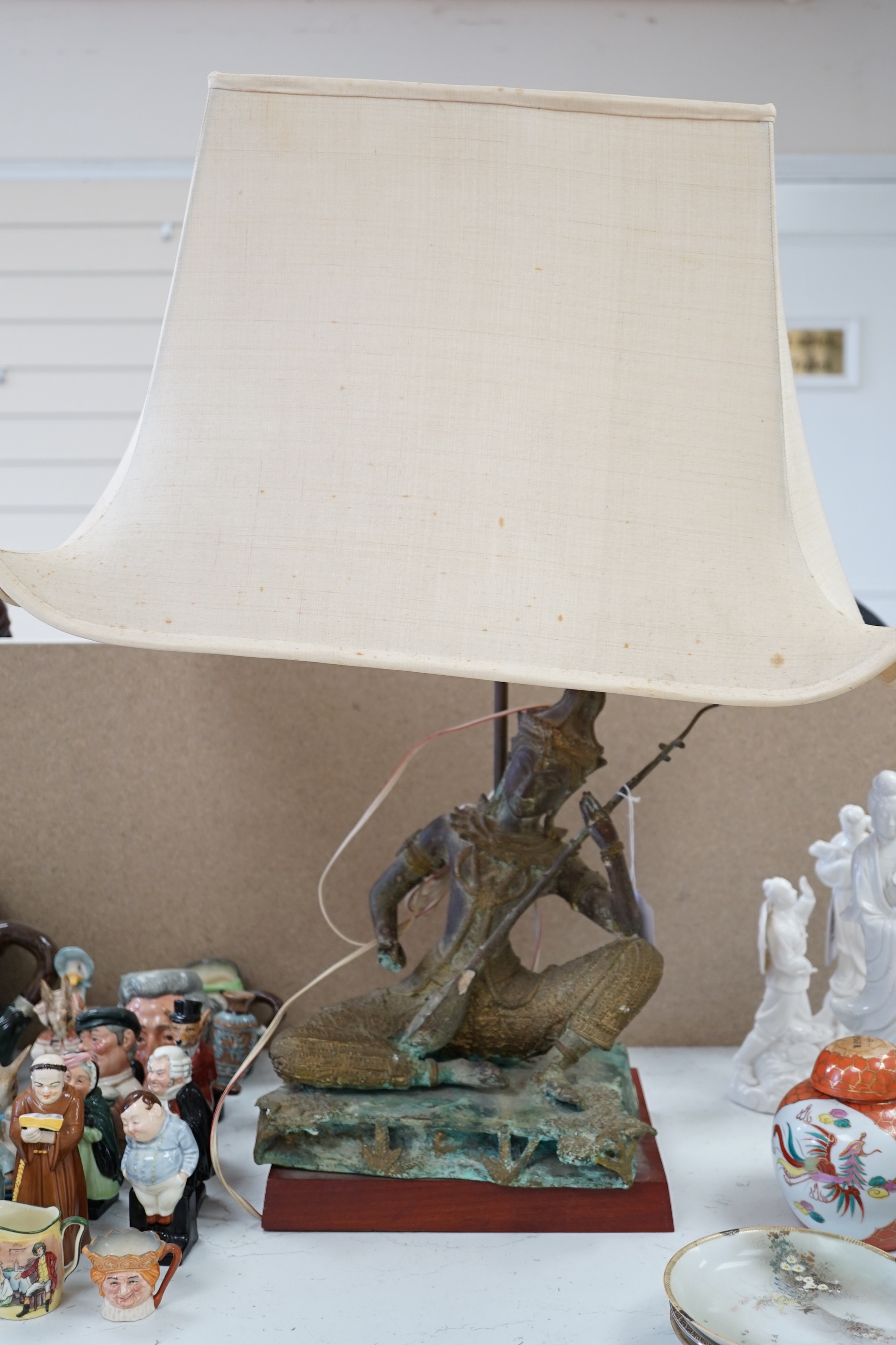 A Thai bronze figural table lamp, figure 36cms high